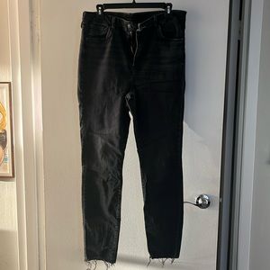 H&M & Denim faded black jeans with raw hem. Size US 16